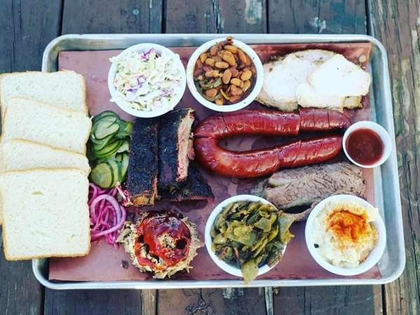 assorted bbq ribs and sides